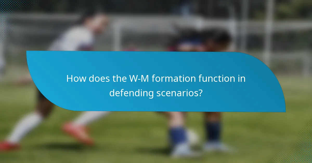 How does the W-M formation function in defending scenarios?
